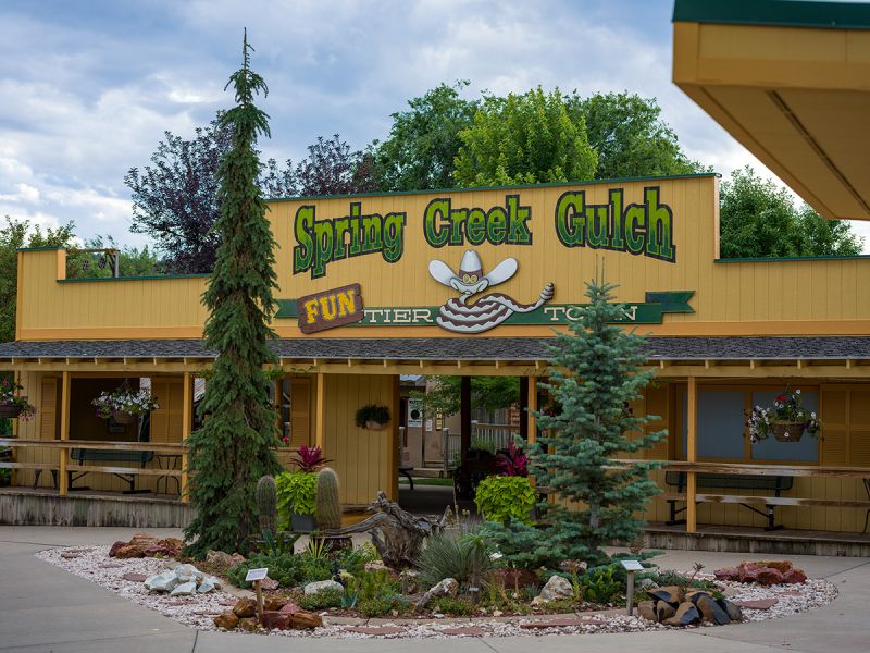 Image of the entrance of Spring Creek Gulch, the Funtier Town at Reptile Gardens.